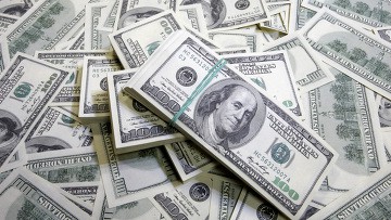 Средневзвешенный курс доллара на ЕТС на 11.30 мск вырос на 45,04 коп - до 31,39 руб