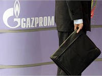 ОАО  "Газпром" выплатит дивиденды на 33% ниже уровня 2011 года